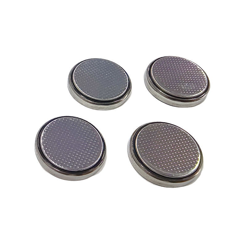 How can the impurity content be strictly controlled in the manufacturing process of button batteries to avoid the risk of short circuits?